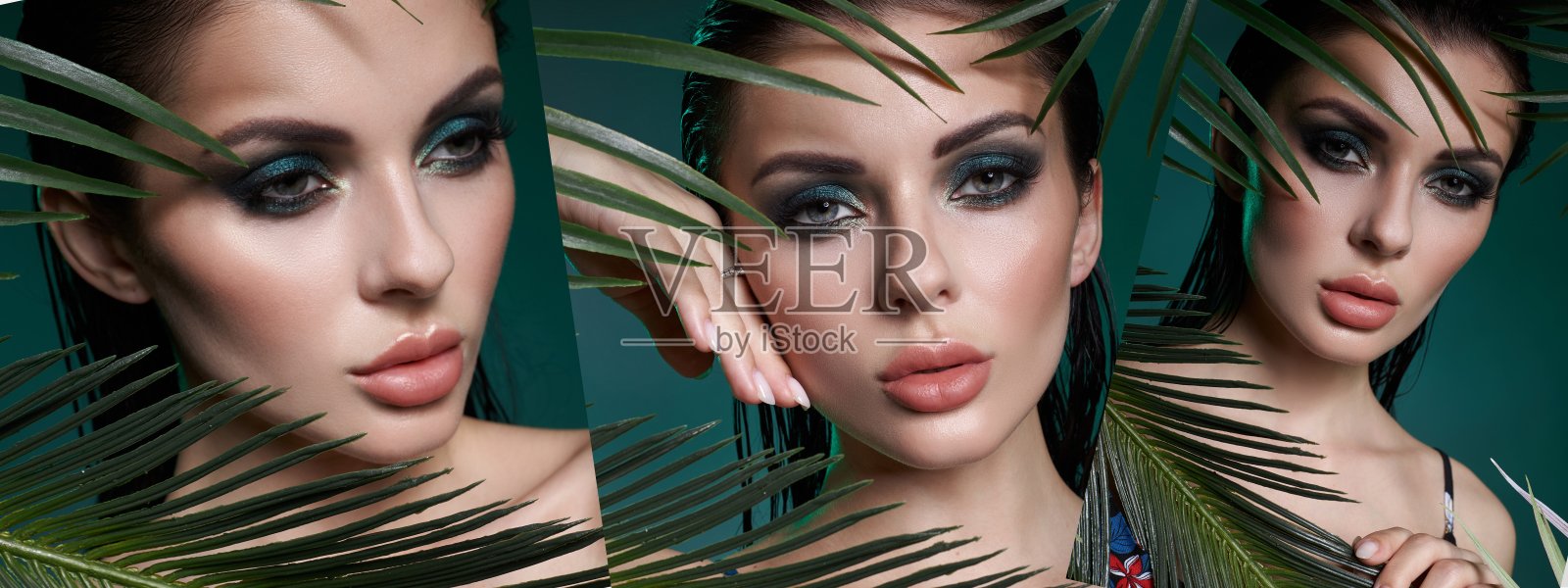 一名涂着深绿色眼影、头发湿润的女子在蓝绿色背景下用棕榈叶在脸前摆姿势照片摄影图片