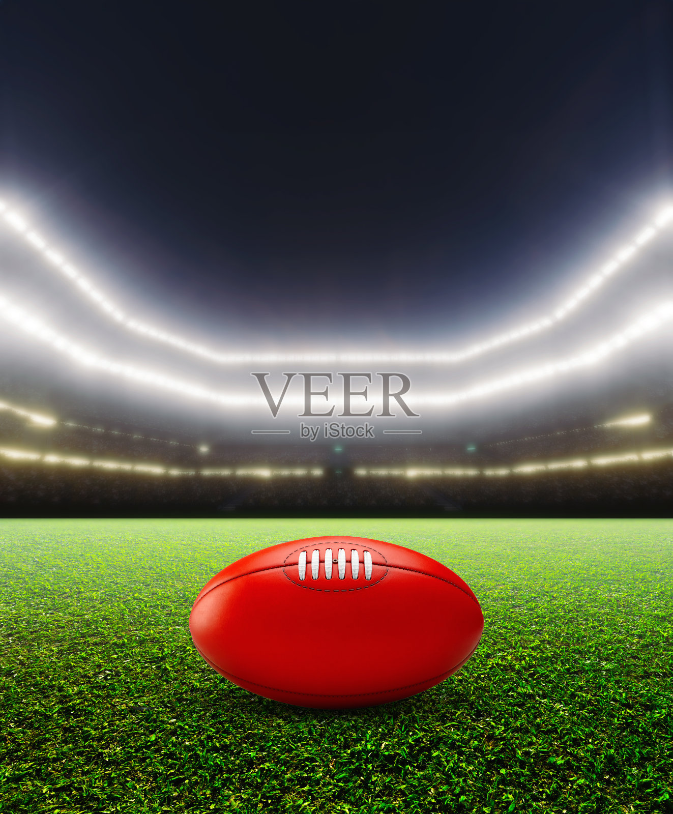 澳大利亚规则泛光灯照亮体育场之夜照片摄影图片