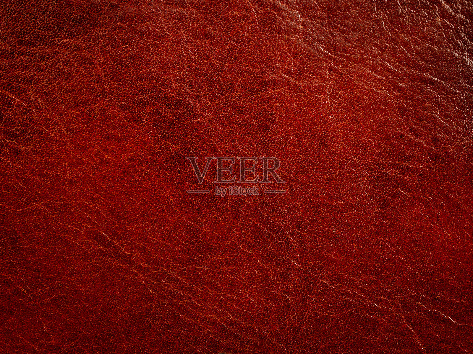 材质为皮革,为鲜红色,水牛皮,选择性聚焦照片摄影图片