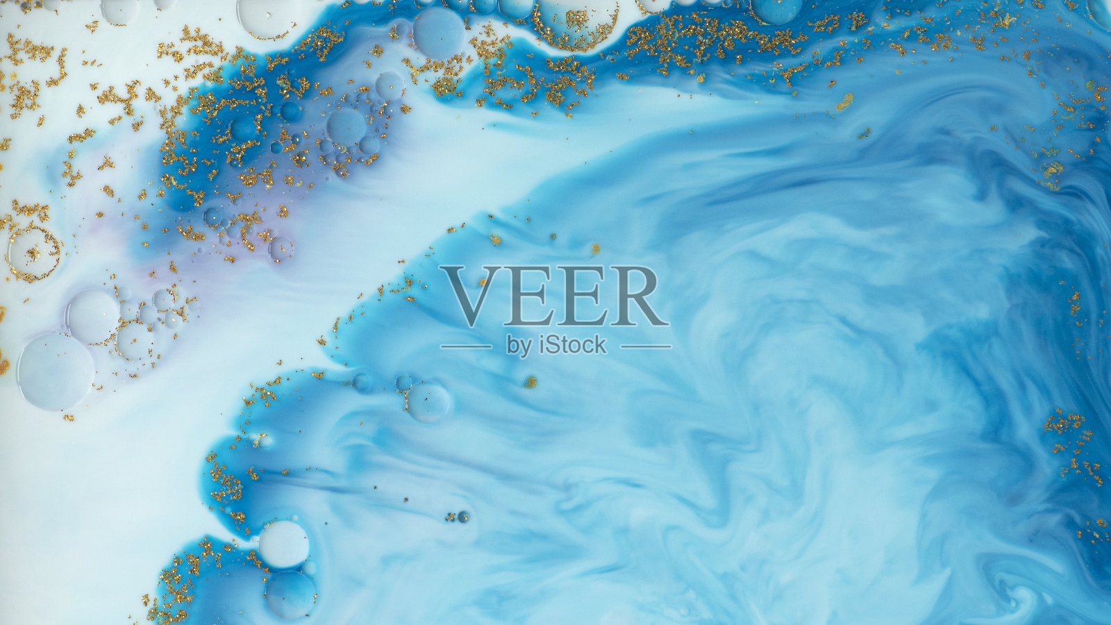 抽象蓝色水彩与金色闪闪发光的背景照片摄影图片