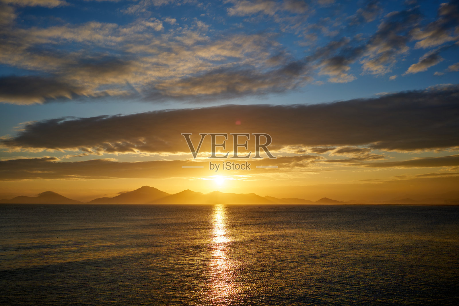 大浦海滩的日落照片摄影图片