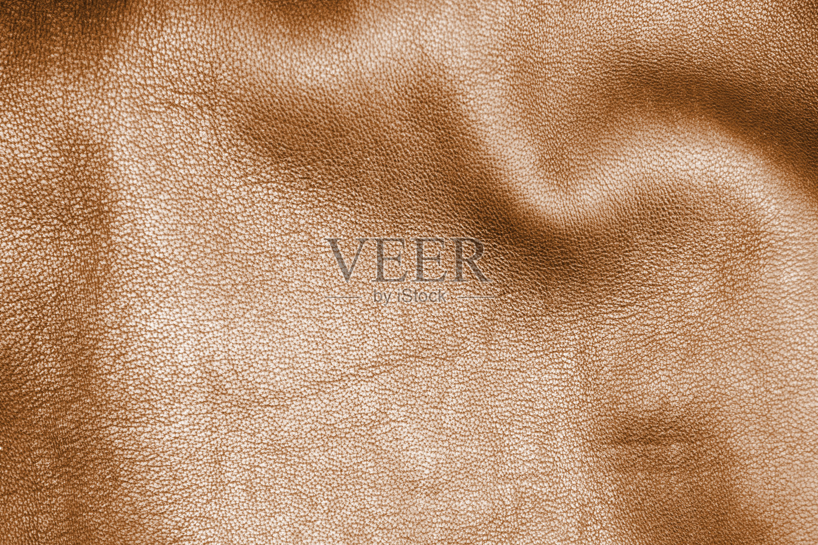 皮革纹理背景。部分穿孔棕色皮革细节。穿孔皮革纹理背景。纹理皮革照片摄影图片