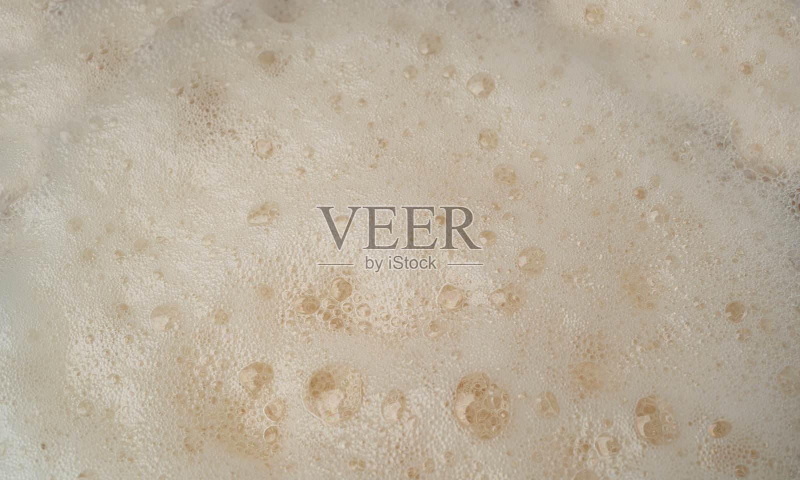 啤酒泡沫纹理,酒精泡沫特写,啤酒泡沫图案,金色啤酒泡沫纹理照片摄影图片