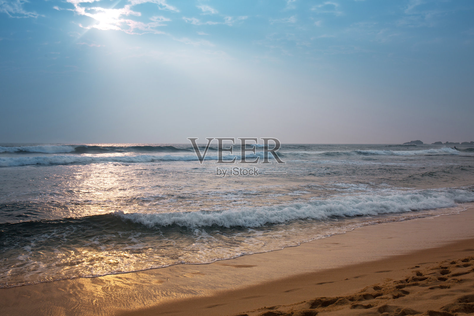 美丽的海景,在海洋的海岸日落变化的太阳照片摄影图片