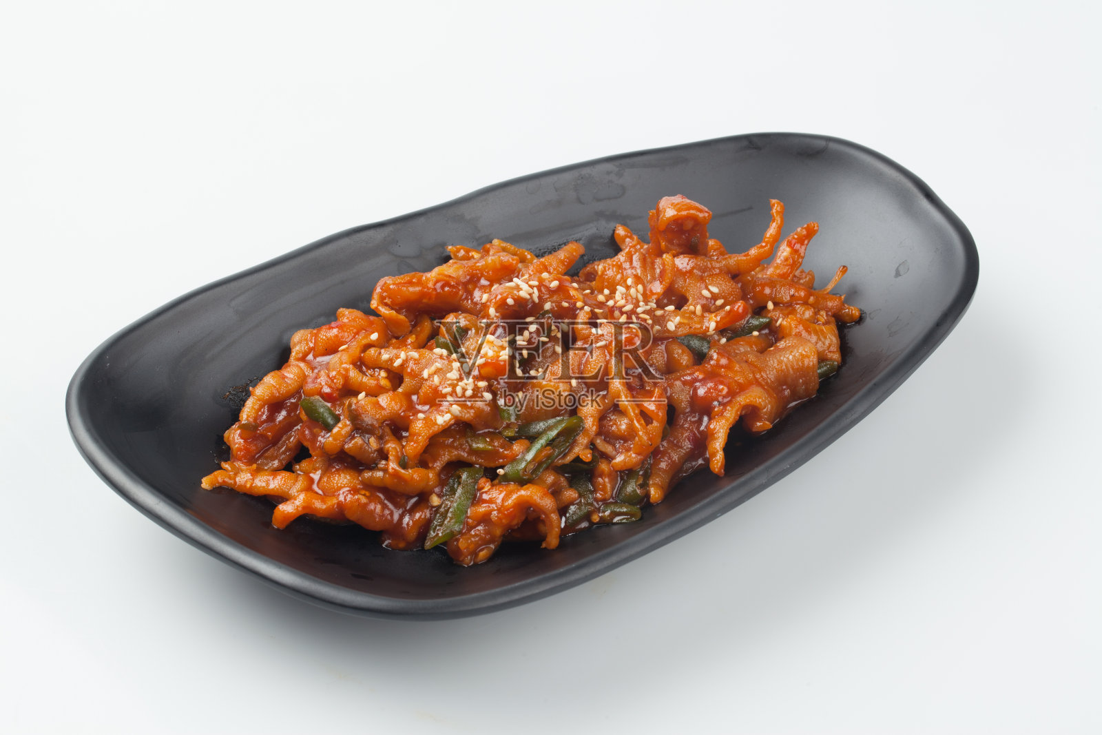 鸡爪是做给人吃的。照片摄影图片