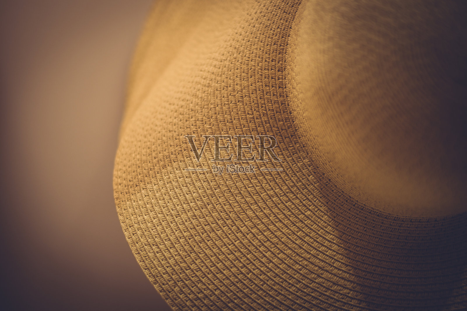 米色编织帽特写照片摄影图片