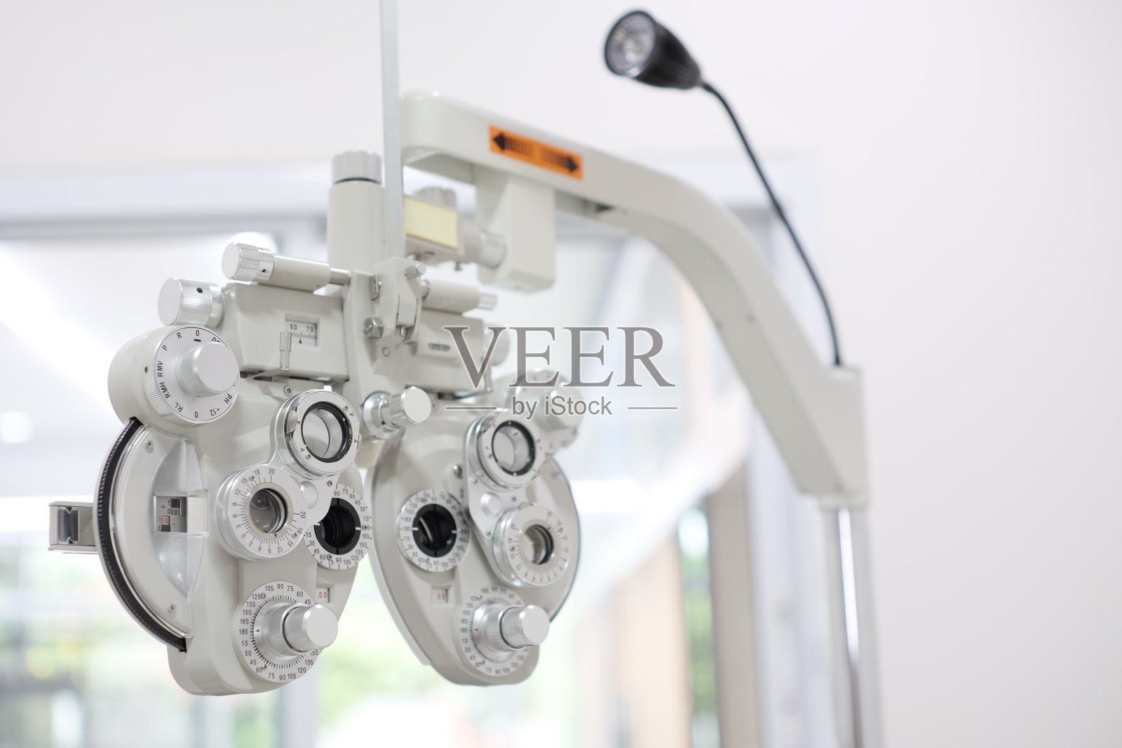 眼科检查用的放大镜,眼科检查用的镜片照片摄影图片