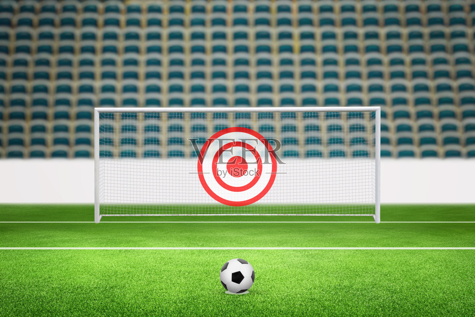 球门中间有一个红色的目标。概念代表体育和商业上的成功,象征着精确、专注和成就。非常适合励志主题照片摄影图片