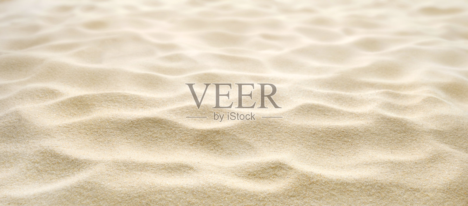 柔软的沙漠沙子与美丽的纹理和图案温柔的波浪探索照片摄影图片