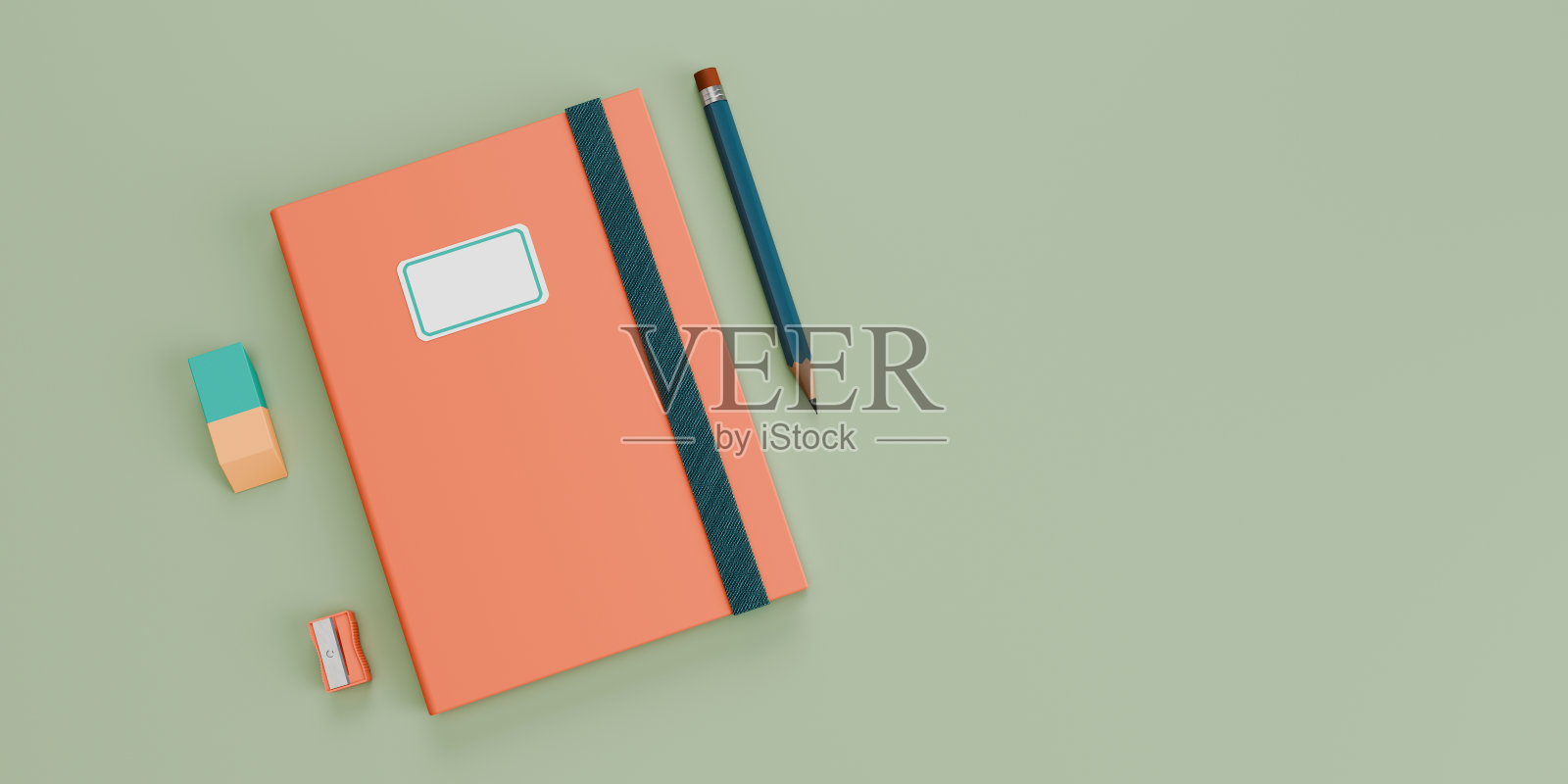 绿色背景的学习用品。照片摄影图片