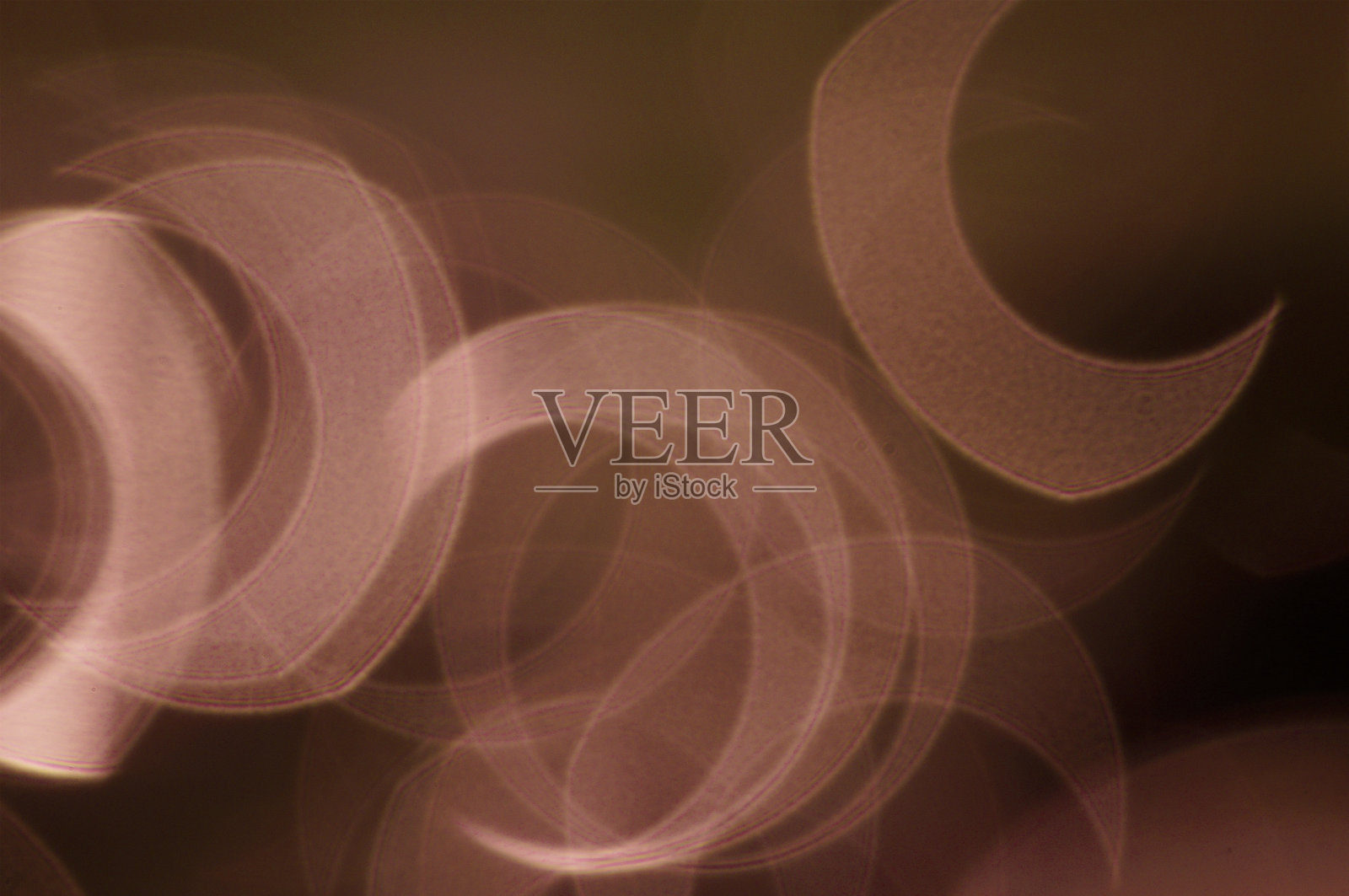 抽象模糊紫色背景。用圆圈散景。照片摄影图片