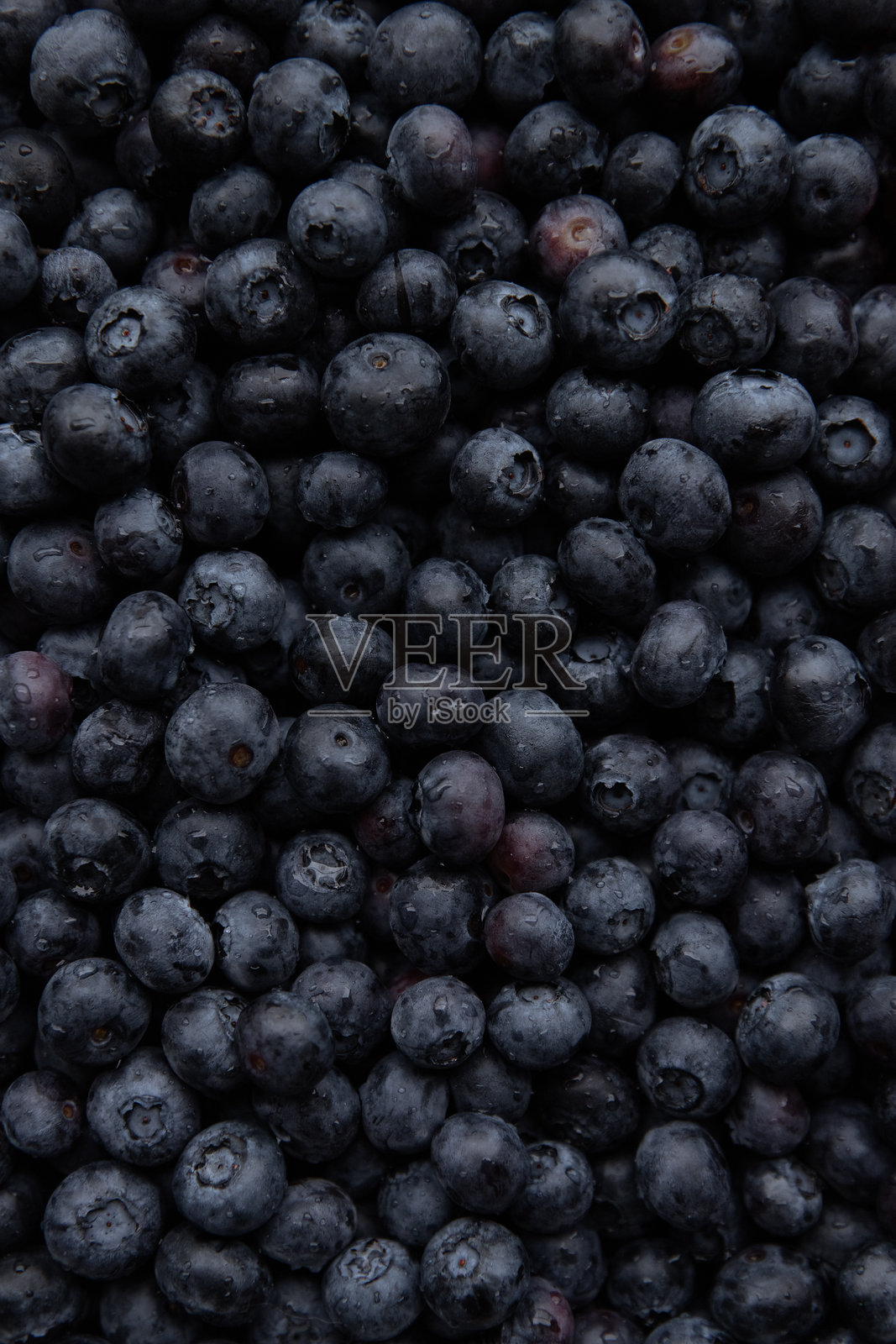 背景是新鲜蓝莓,俯视图。照片摄影图片