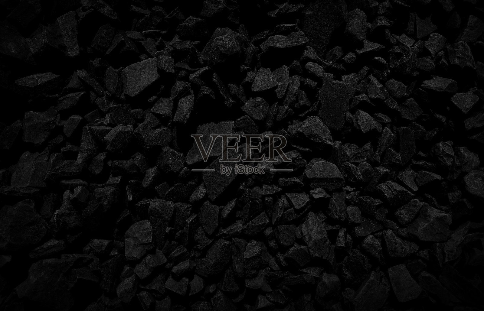 黑色粗糙的鹅卵石路像纹理效果的垃圾抽象颗粒状水平背景,是空白和空白,并有鹅卵石,石头或岩石马赛克图案的设计照片摄影图片