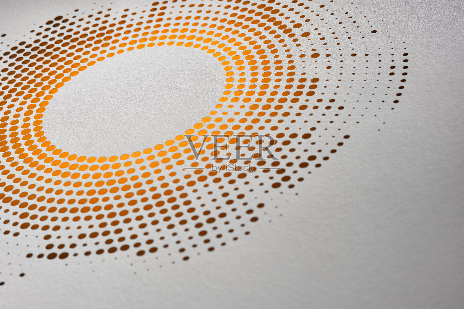 圆形渐变纸艺术与暖色调的橙色和黄色,创造了一个优雅和复杂的设计。照片摄影图片