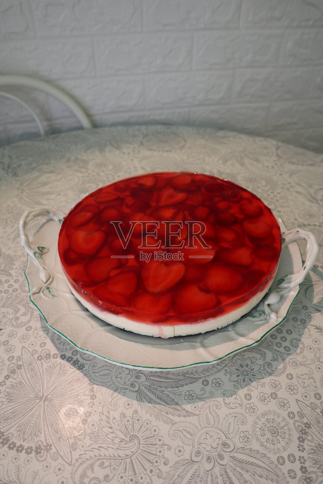 草莓芝士蛋糕照片摄影图片