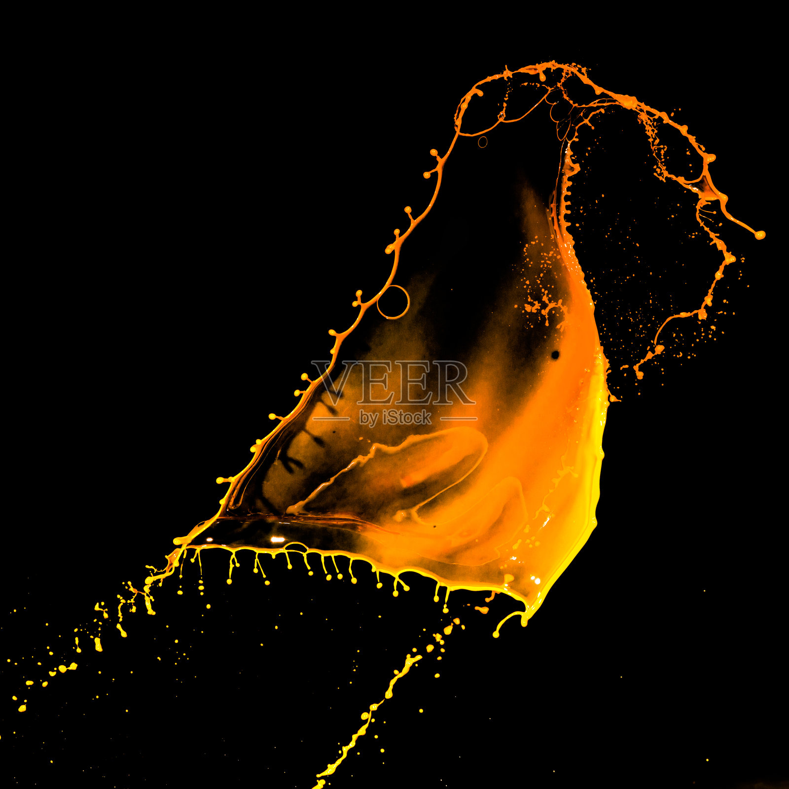 飞溅的橙色墨水照片摄影图片