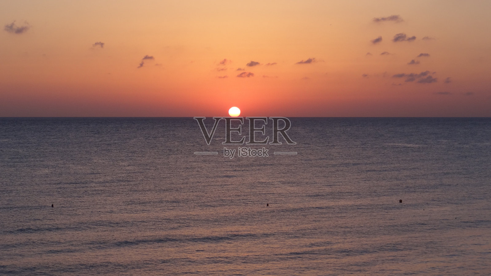 橙色天空下的海景照片摄影图片