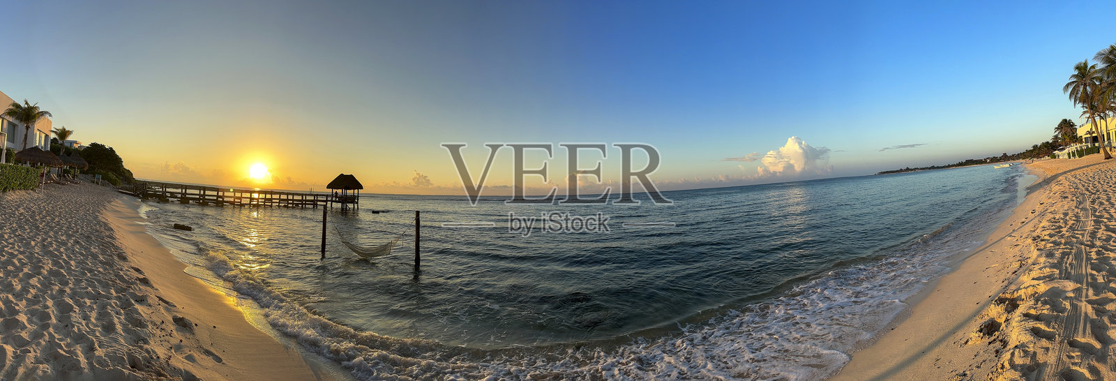 加勒比海日出天堂:温暖的水域,金色的沙滩和宁静的吊床照片摄影图片