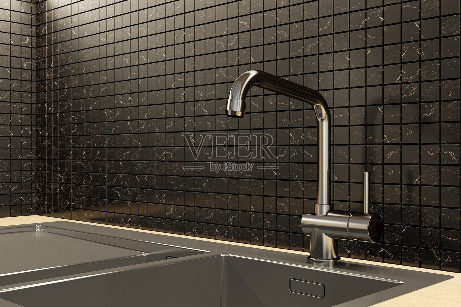 厨房中深棕色大理石瓷砖马赛克的现代水龙头和Inox水槽特写照片摄影图片