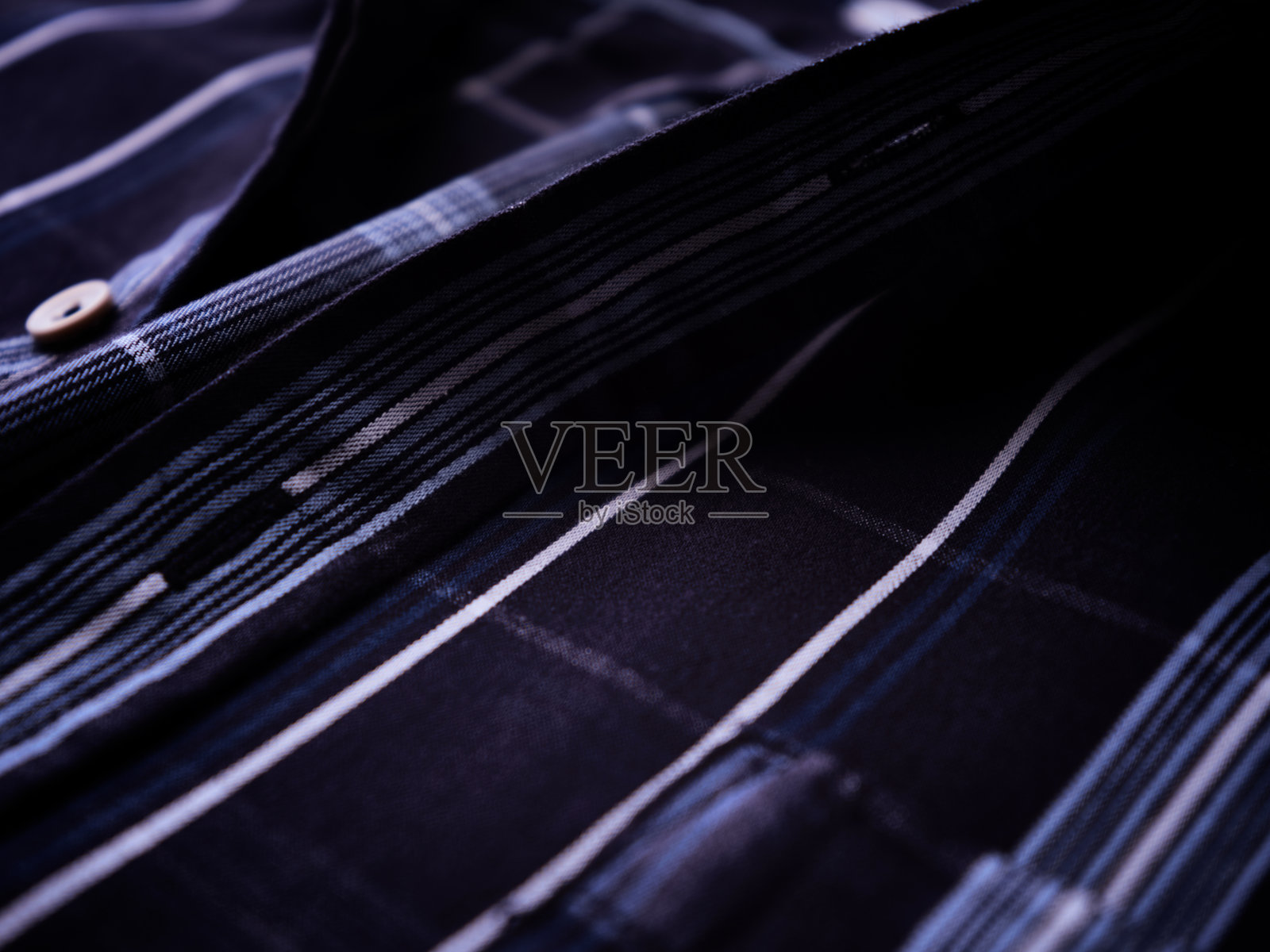 男士格子衬衫的特写。照片摄影图片