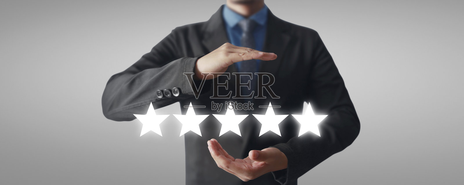 手握五星好评照片摄影图片