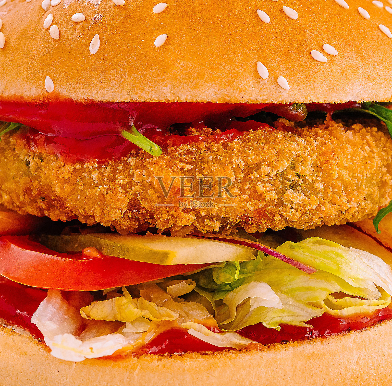 酥脆鸡肉汉堡特写照片摄影图片