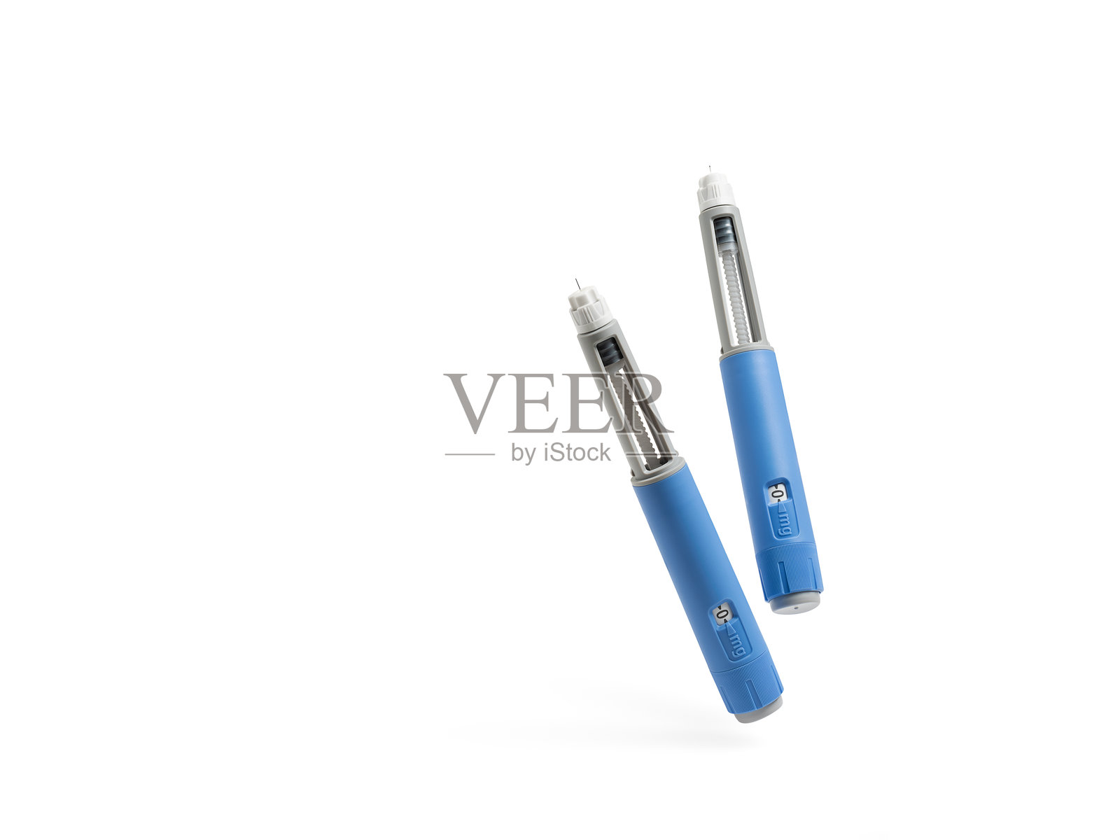 白色背景下的两支司美格鲁肽减肥笔(抗糖尿病或抗肥胖药物)照片摄影图片