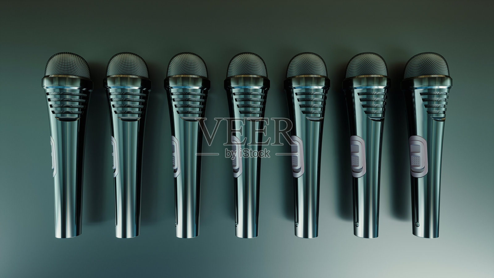 几只无线黑色麦克风置于黑色背景上照片摄影图片