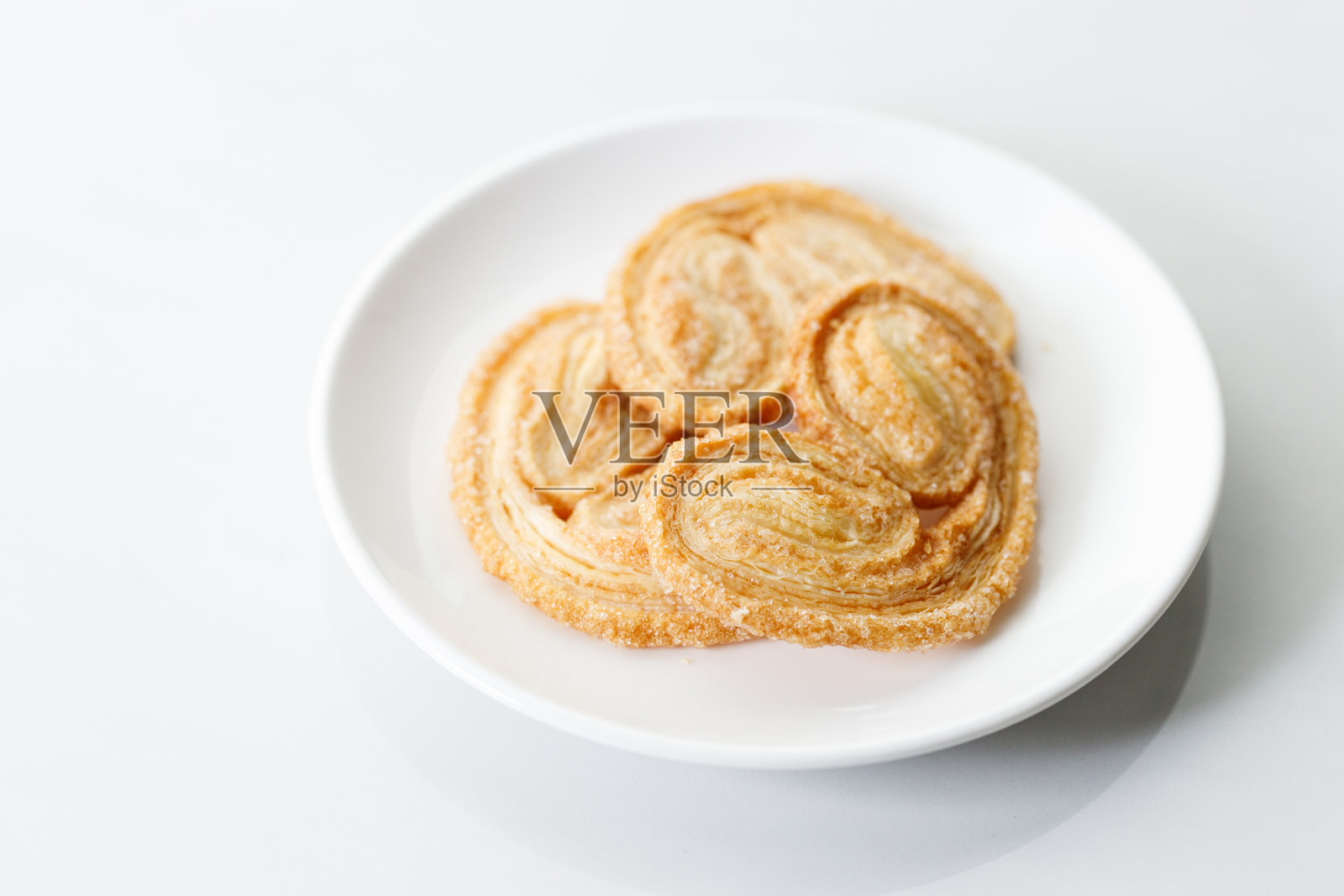 棕榈蝴蝶酥与咖啡照片摄影图片