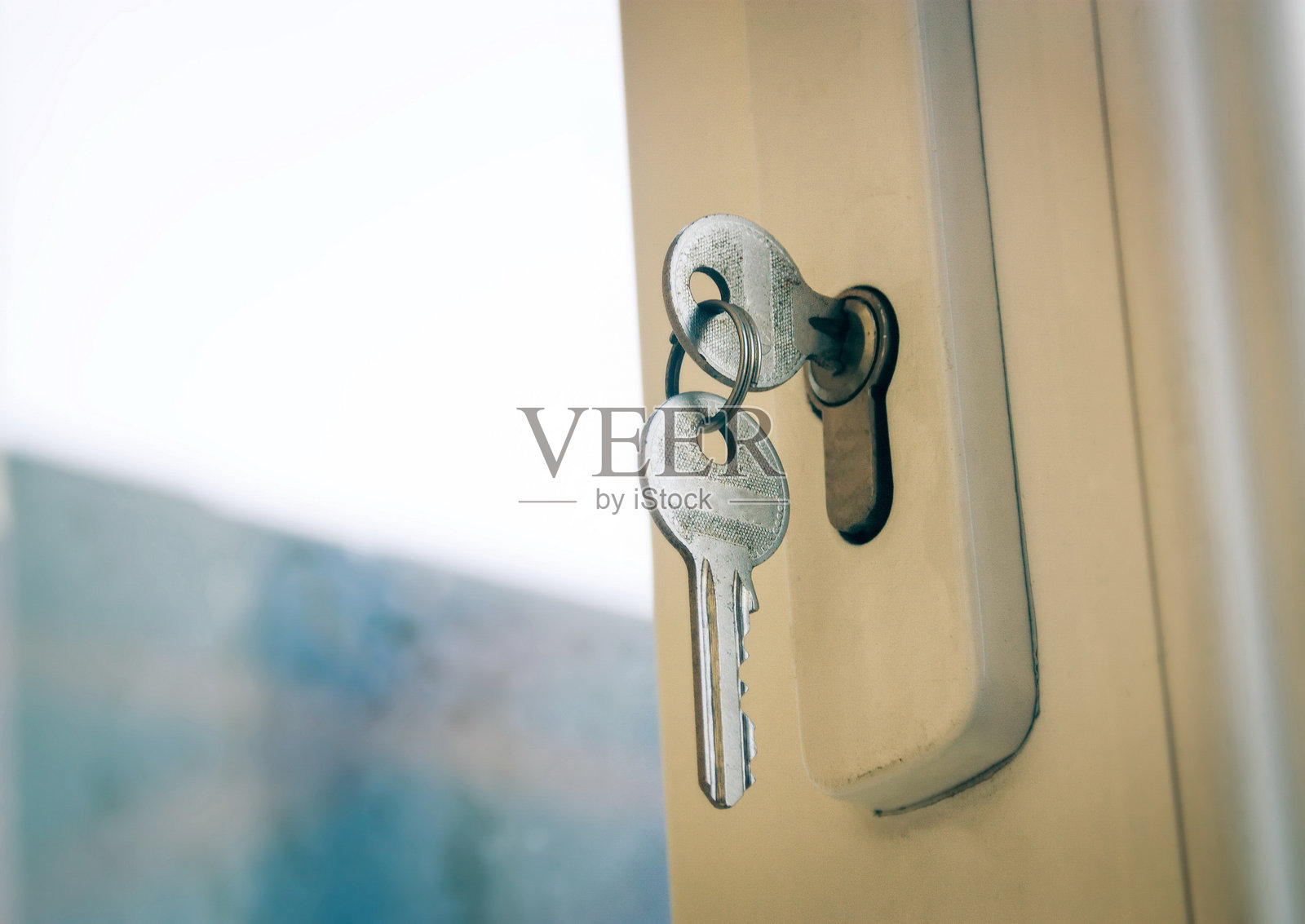 锁孔中的钥匙特写照片摄影图片