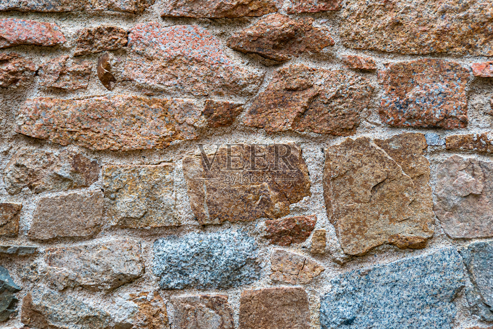 古老的石墙或岩石墙背景。古代砌砖图案纹理照片摄影图片