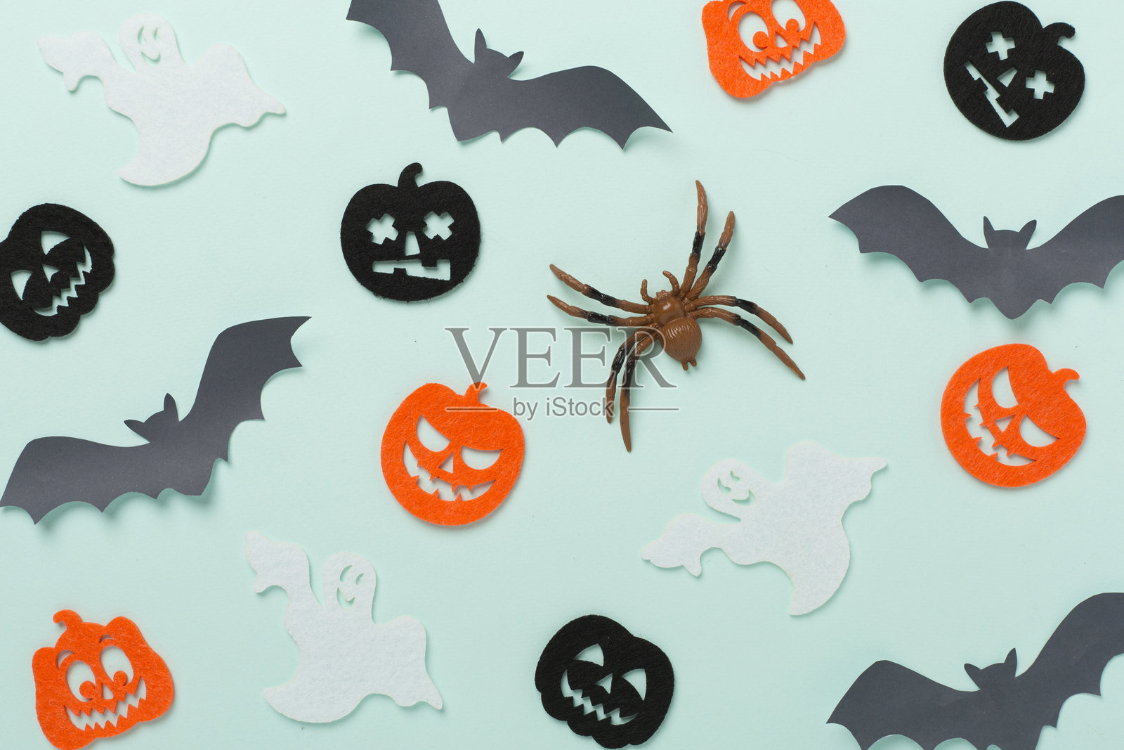 万圣节装饰在彩色背景上,俯视图照片摄影图片