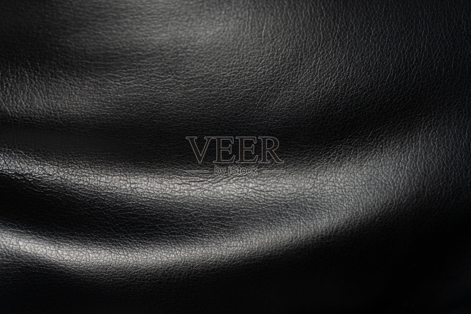 带有精细图案的纹理人造皮革,自然垂坠。照片摄影图片