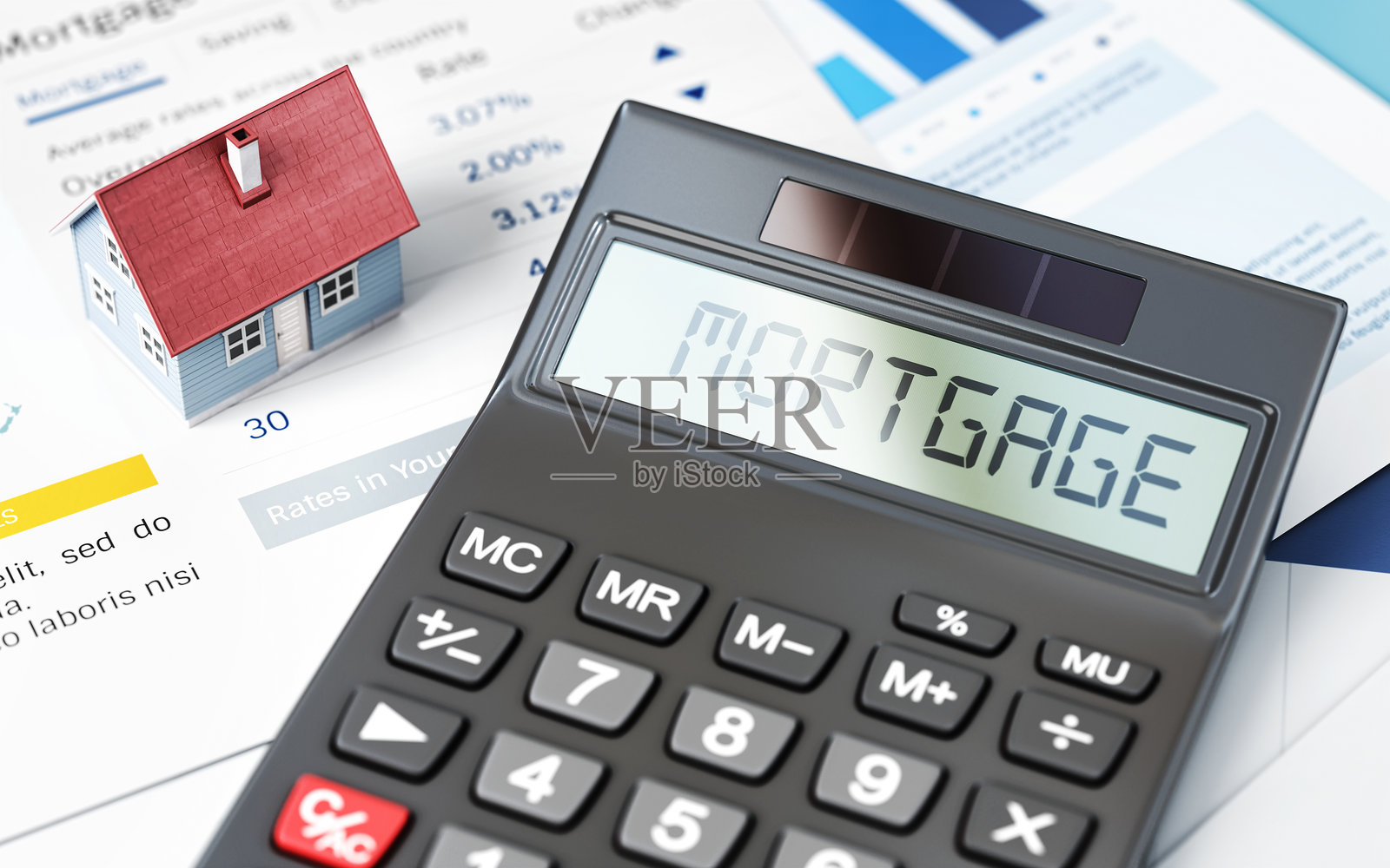 办公室内,数字显示屏上显示“抵押贷款”的黑色计算器照片摄影图片