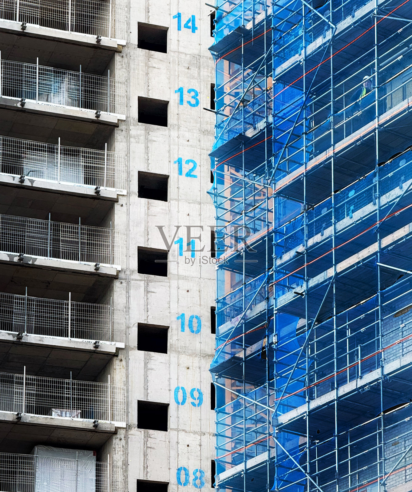 西伦敦正在建设中的高层建筑,带有楼层编号照片摄影图片