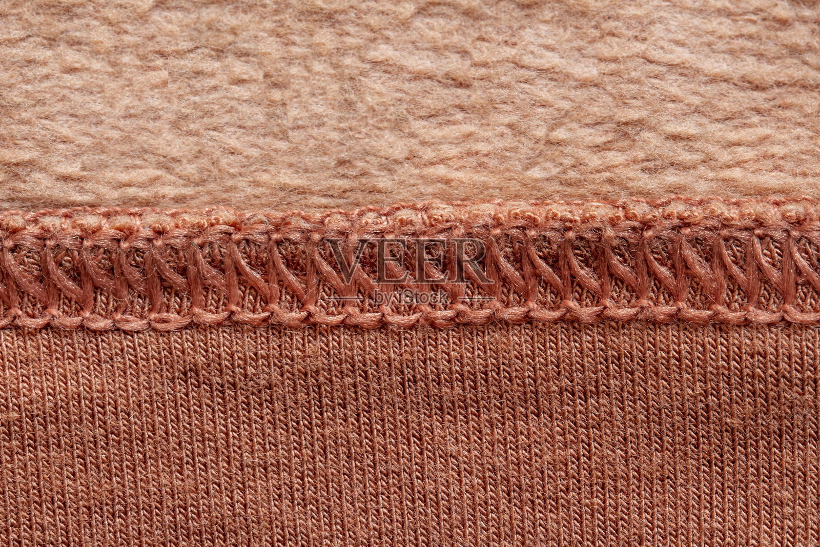 棕色布料上的包缝背景照片摄影图片