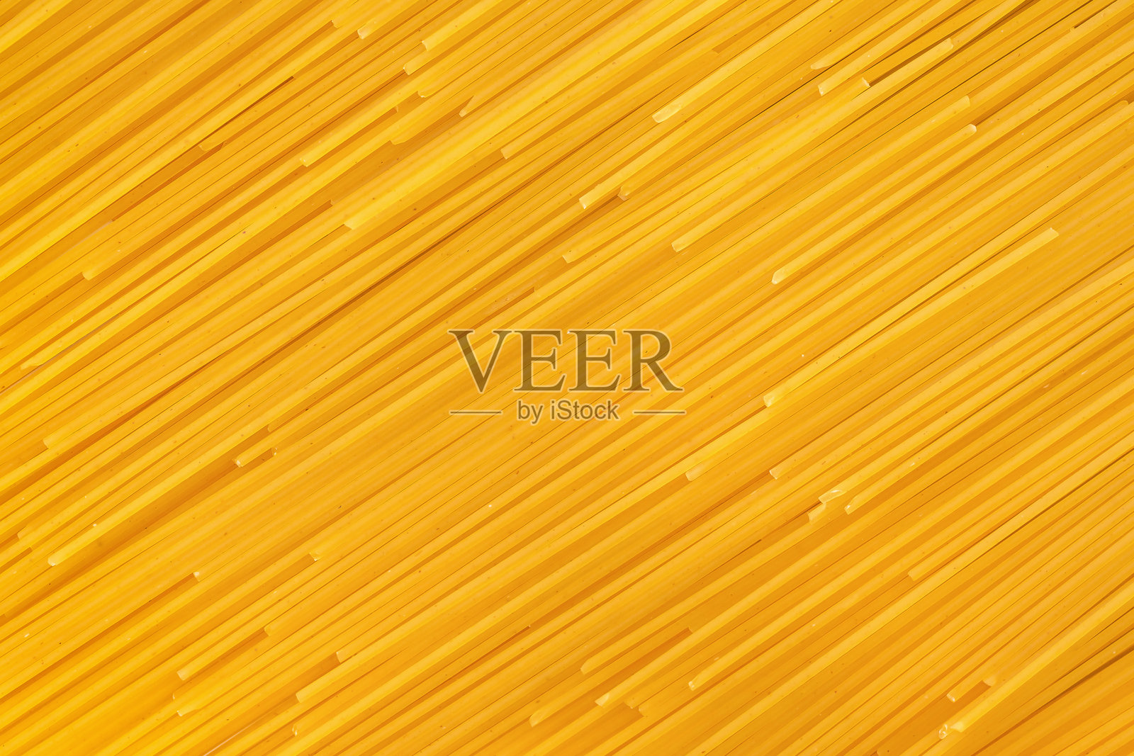 生意未煮的意大利面特写,俯视图。意大利面背景纹理照片摄影图片