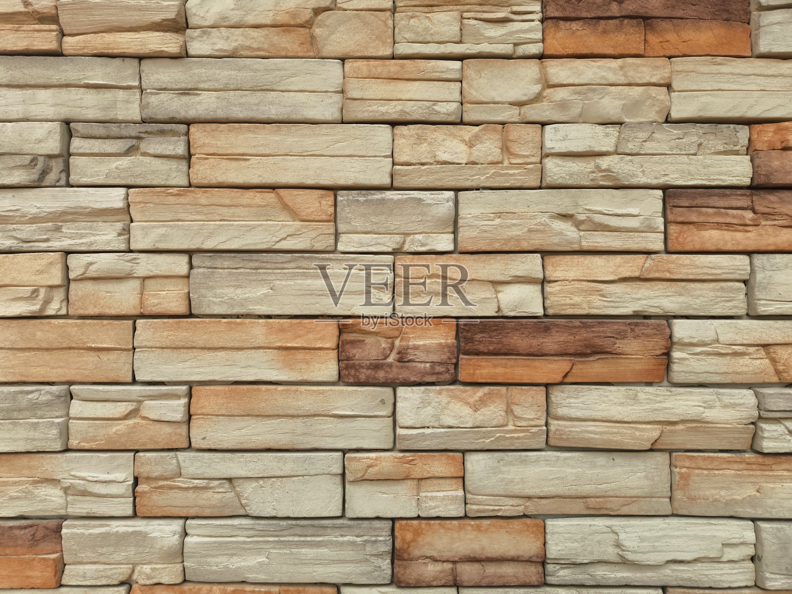 岩石墙纹理。自然花岗岩背景,适用于背景、展示、演示和模型。花岗岩用于墙面和地板瓷砖设计。适合外部或内部设计和装饰的创意。照片摄影图片