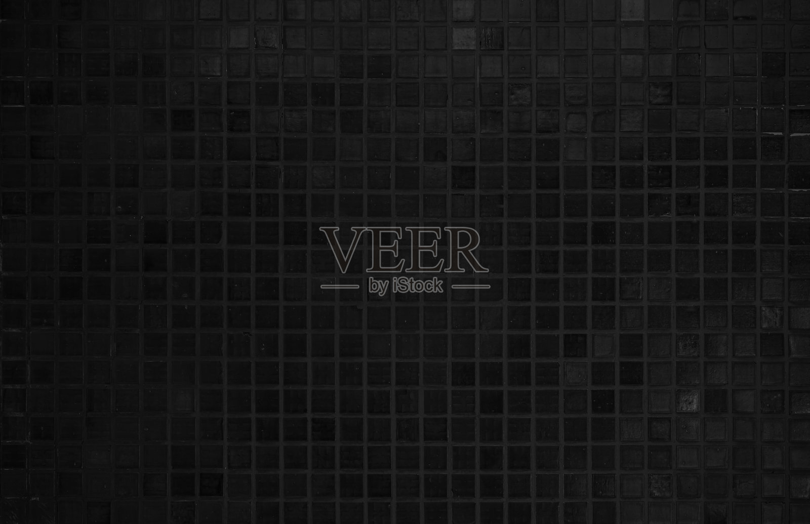 黑色陶瓷墙面和地砖马赛克背景,适用于浴室。几何设计图案,带有网格壁纸纹理装饰的泳池。简单无缝的抽象表面磨损效果。照片摄影图片