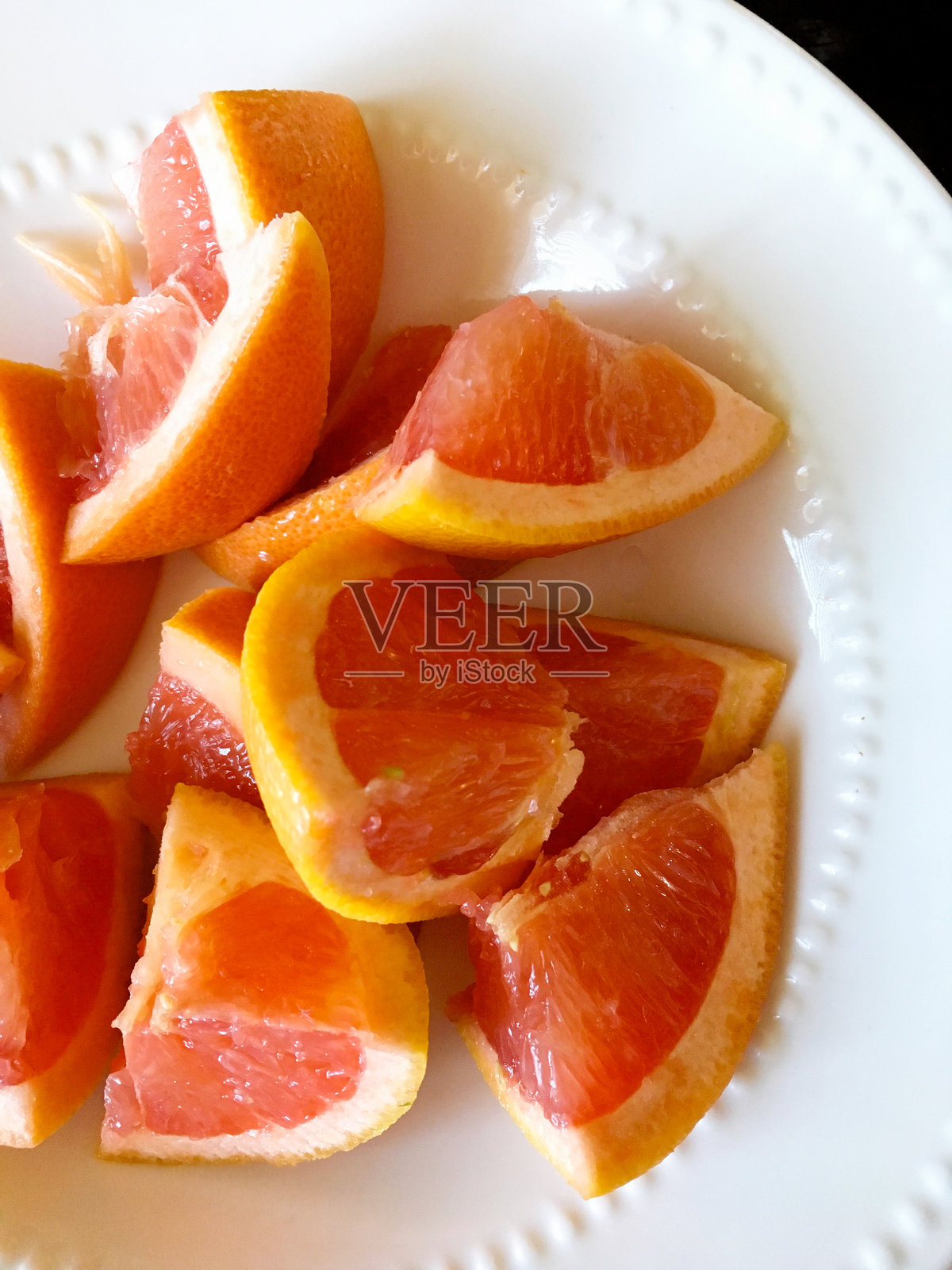 清爽的葡萄柚片碗照片摄影图片