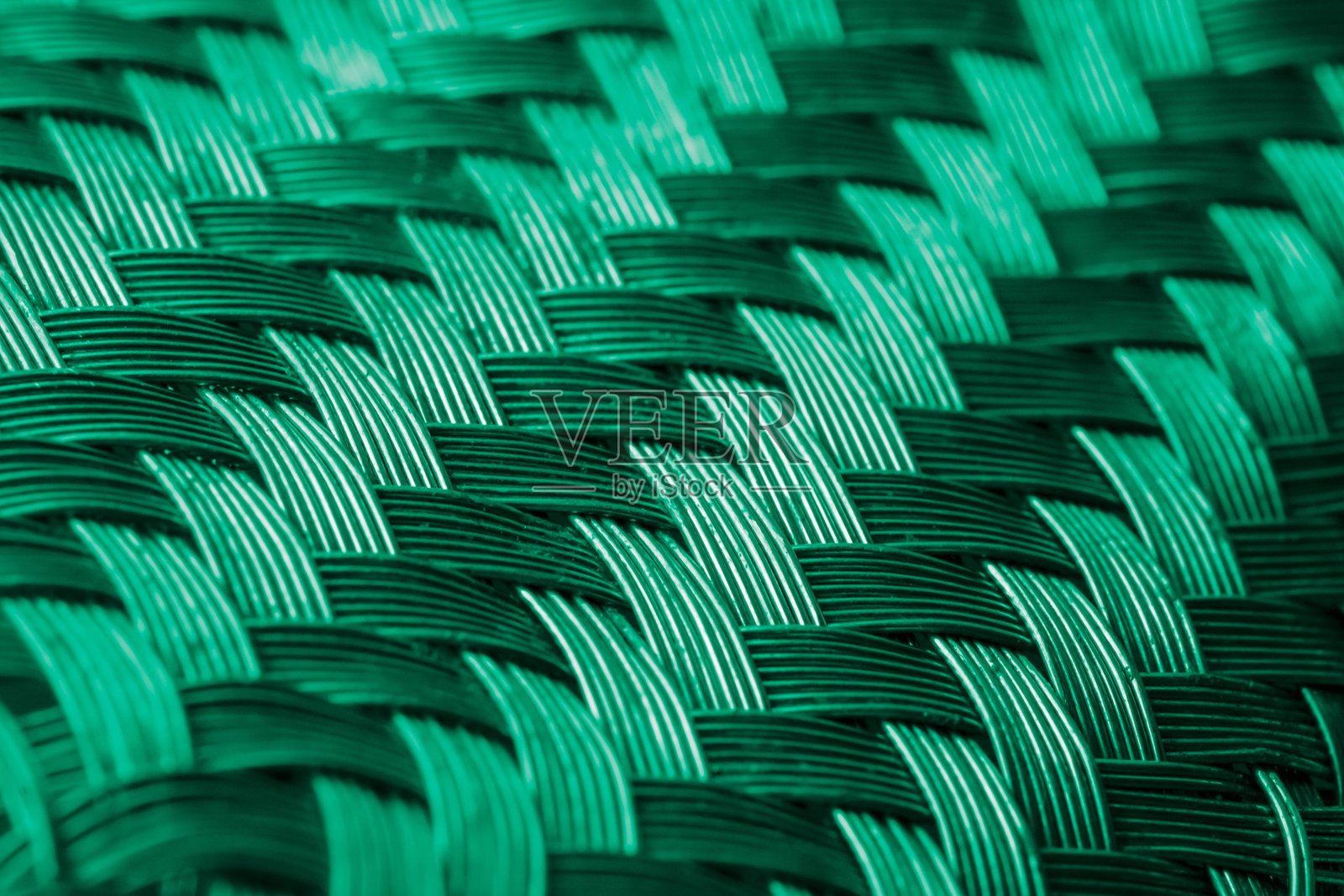 绿色编织金属网背景或纹理照片摄影图片