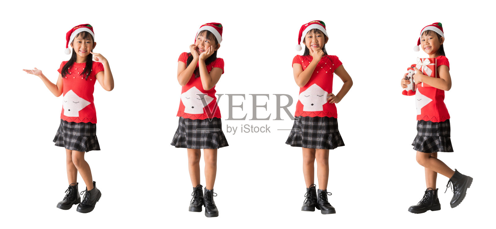 一组快乐微笑的亚洲小女孩,穿着红色圣诞服装和圣诞老人帽,庆祝姿势,背景为白色,带有抠图路径。照片摄影图片