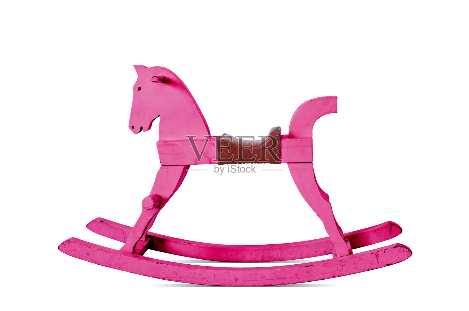 粉色摇摇马在白色背景上照片摄影图片