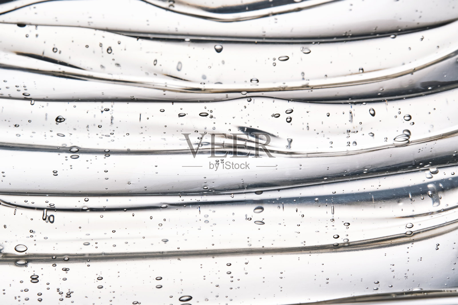 发胶或面部透明质酸凝胶的质地。照片摄影图片