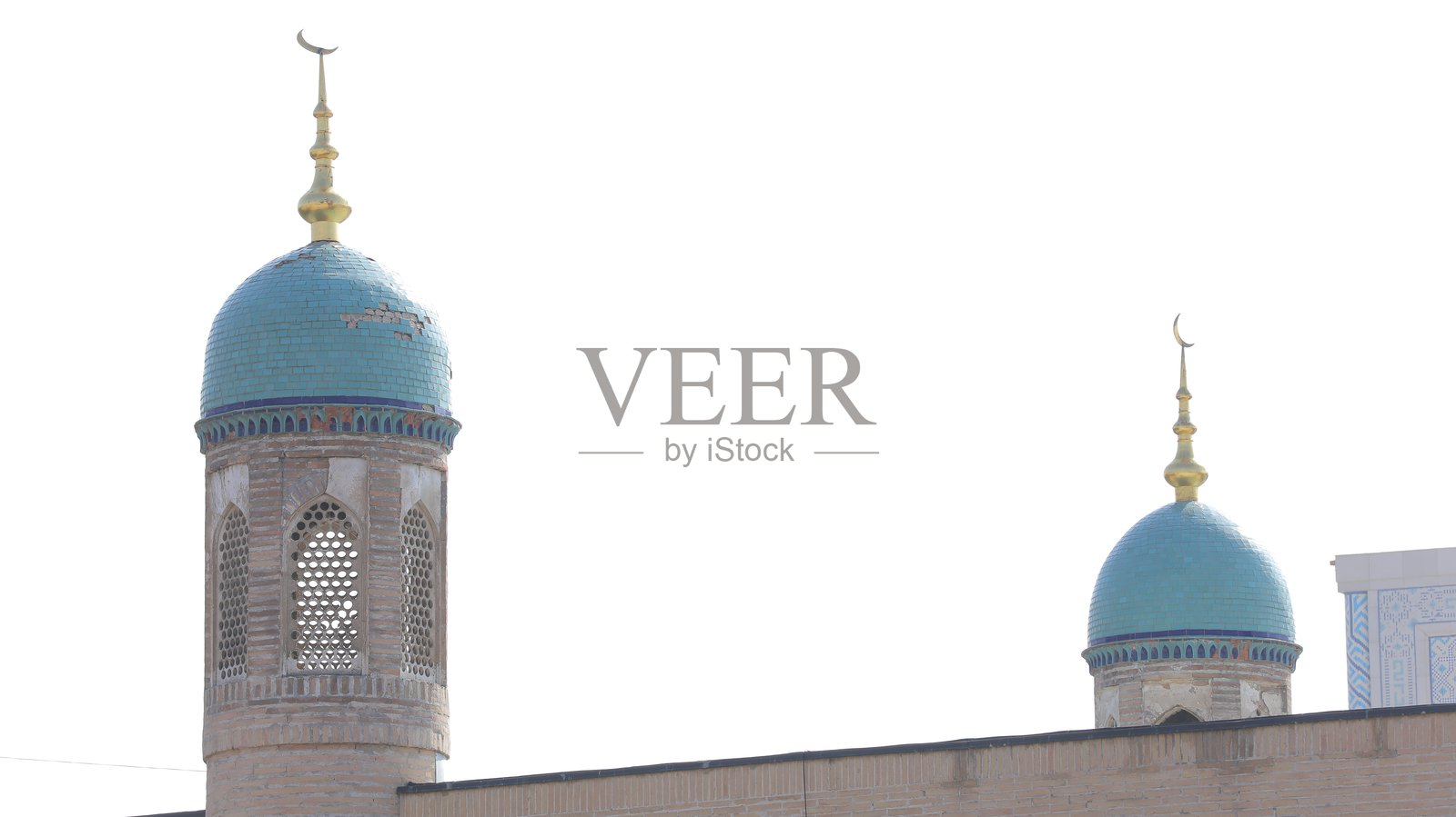 一个蓝色圆顶,上面有一个金色的顶部,顶部有一只鸟。照片摄影图片