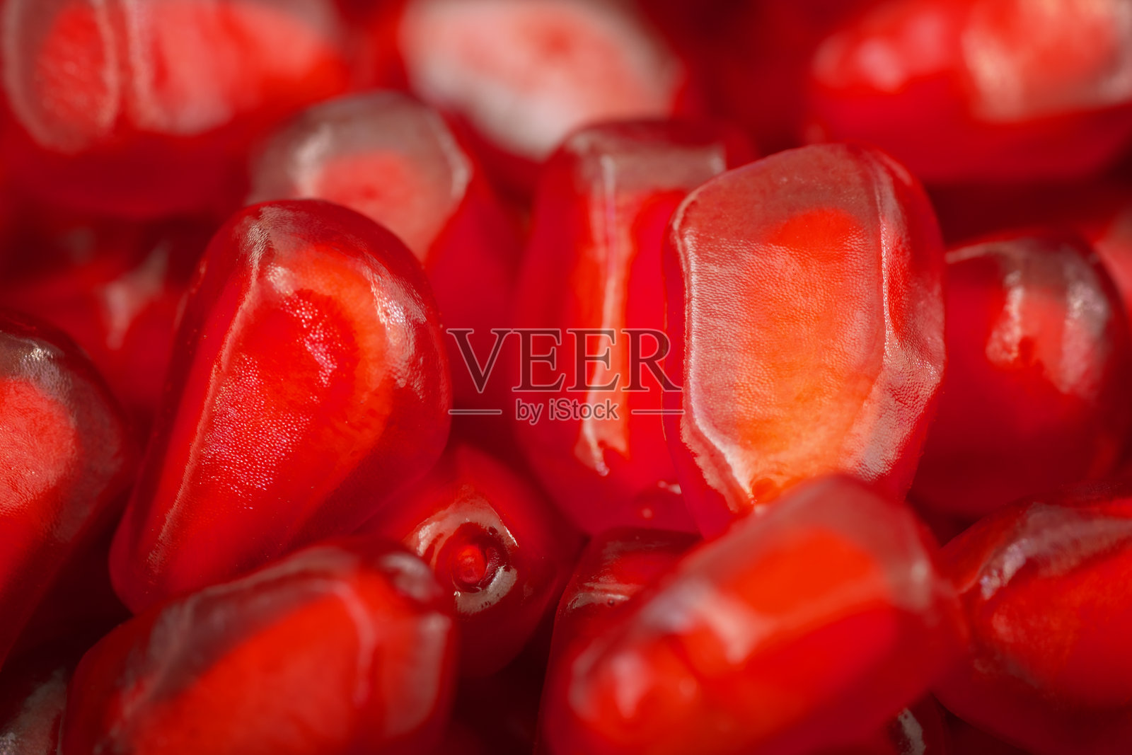 石榴的特写镜头。照片摄影图片