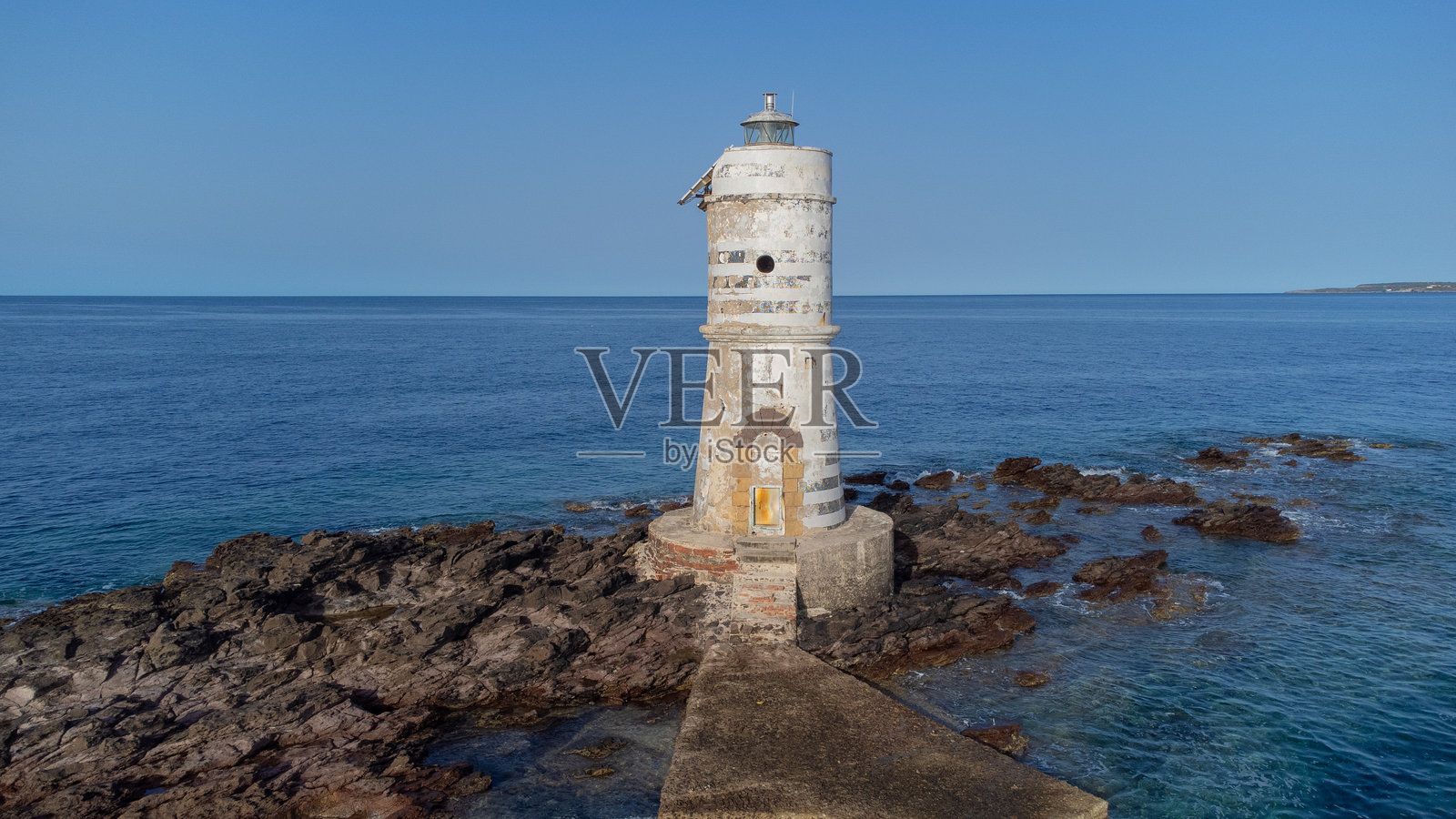 卡拉塞塔南部撒丁岛的曼贾巴尔克灯塔,航拍图像照片摄影图片