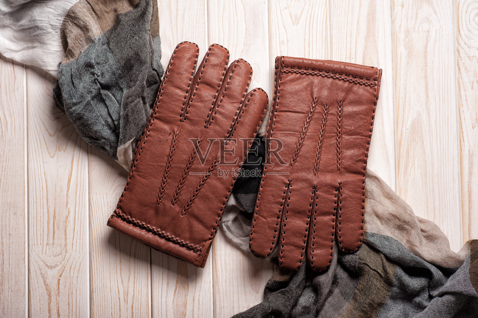特写棕色皮革手套照片摄影图片