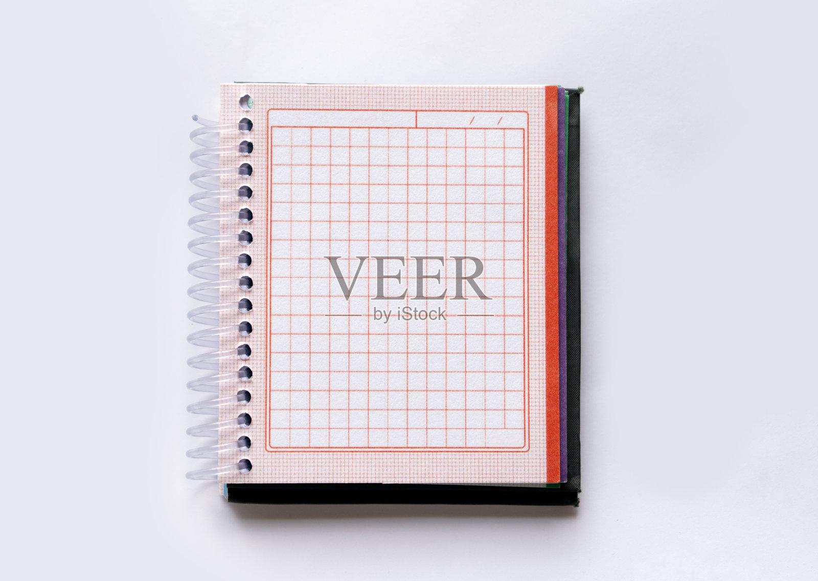 螺旋装订的方格纸笔记本照片摄影图片