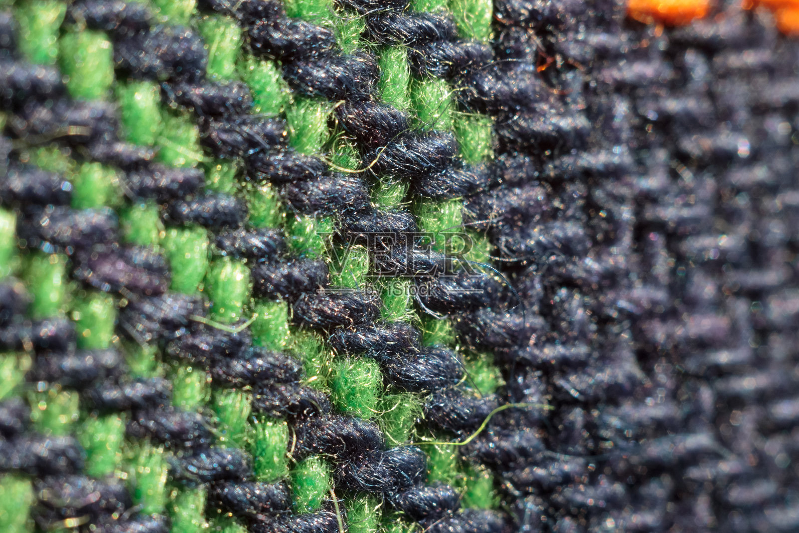 织物纹理的微距摄影,细致展现柔和的波浪和图案,营造出触感舒适和艺术优雅的印象照片摄影图片